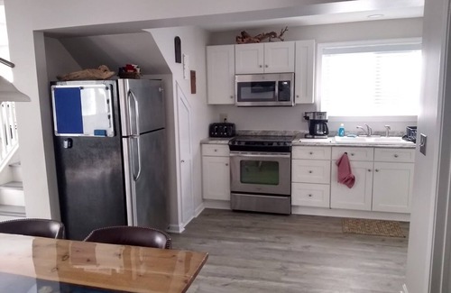 Wilson House | “The Red House” Family friendly vacation home close to beach and lake access.