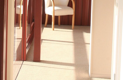 Cable Bay House | The Red Shed - Spectacular Sea Views