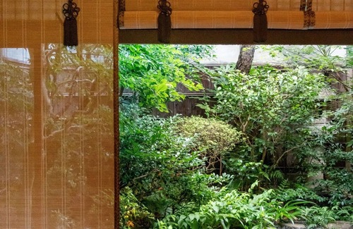 Gion House | The room is a special maisonettetype room with a private garden and a cypress bathtub The room is /Kyoto Kyōto