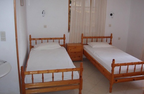 Mithimna House | The Schoolmistress With the Golden Eyes