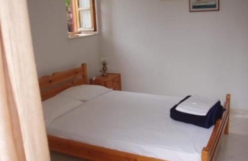 Mithimna House | The Schoolmistress With the Golden Eyes