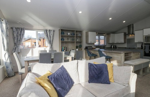 Carnforth Cottage | THE THREE BEARS LODGE, CONISTON DRIVE 11, pet friendly in Warton