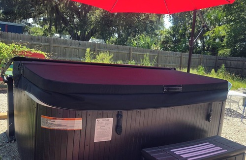 New Smyrna Beach House | The TRAIN House 3/2 w/HOTTUB, WiFi, In delightful New Smyrna deck, grill,yd