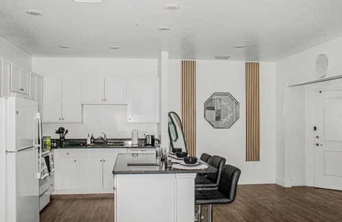 Kissimmee Apartment | The Tuxedo 2BD Stay in Kissimmee with fitness room, Free WIFI, Free Parking