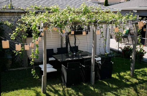 Belmont Cragin Apartment | Theater Game Room Gym Firepit 4BR Home