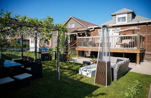 Belmont Cragin Apartment | Theater Game Room Gym Firepit 4BR Home