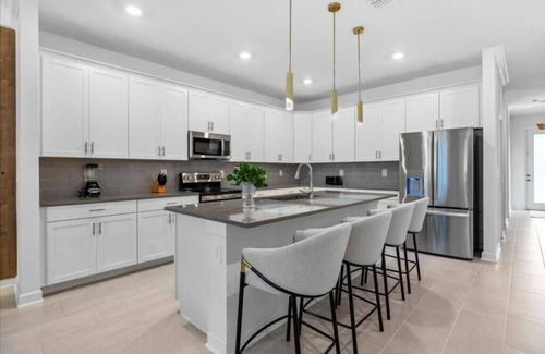 Four Corners Hotel | Themed and modern single family at Champions Gate