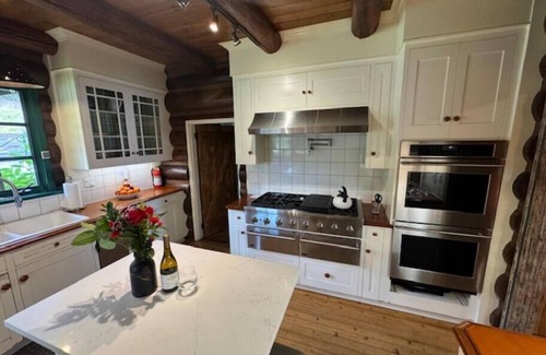 Coeur d'Alene Cabin | This 5 Bedroom Lodge has both History & Luxury while being surrounded by nature
