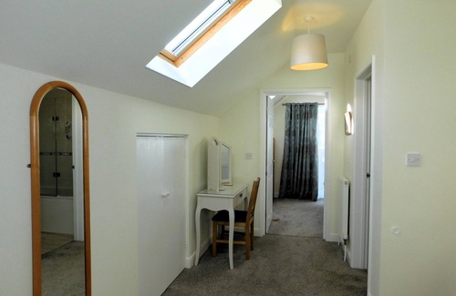 Sheringham House | This attractive modern holiday home is an ideal place to come relax & unwind throughout the year