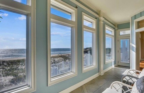 Sea Palm Village House | This beachfront home will truly surprise you with its stunning transformation!
