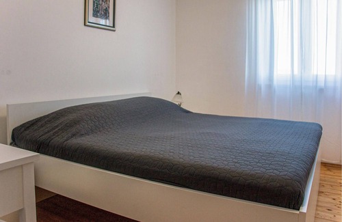 Gondolici Apartment | This functionally furnished apartment is located on a hill with a beautiful view of the sea and the