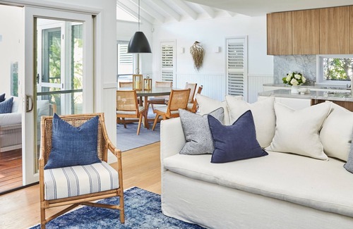 Palm Beach House | This home matches quaint beachside charm with luxurious comfort.