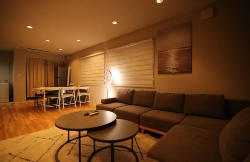 Okubo House | This luxury residence is located in Shin-Okubo, Shinjuku-ku. Accommodates up to 8 people. The home has a full set kitchen and spacious living room.