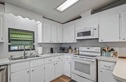 Crawfordville House | This popular 3 BR/2 BA home sits on a canal in the gated community of Paradise Village