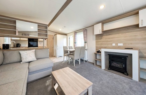 Penrith House | This spacious caravan that sleeps 6 offers everything you need to enjoy your stay at Lowther Park.