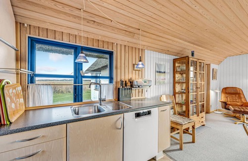 Fjand Badeby House | This thatched cottage is situated on a beautiful nature plot in Fjand.