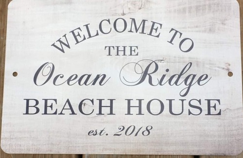 French Village House | Three Bedroom Home With Screened In Porch Only Steps Away From North Shore Beach