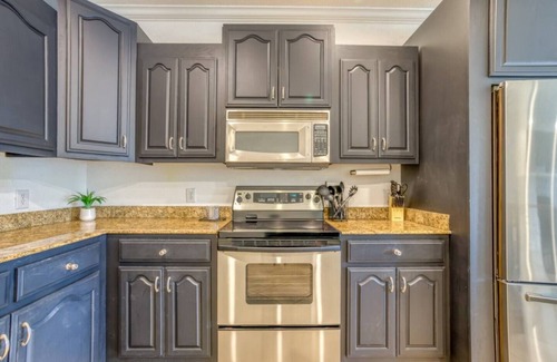 Muscle Shoals House | Three Level Waterfront Condo with Boat Slip near RTJ Golf Course. Two Kings.