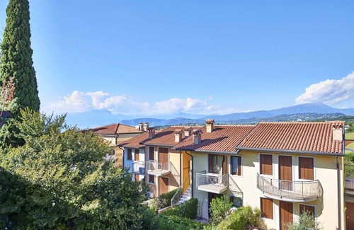 Lazise Apartment | Three-room apartment Lake Garda view wi-fi smart TV air conditioner table on terrace