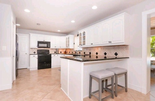 Jensen Beach House | Thumb Point Oasis w/Heated Pool- walk to beach!