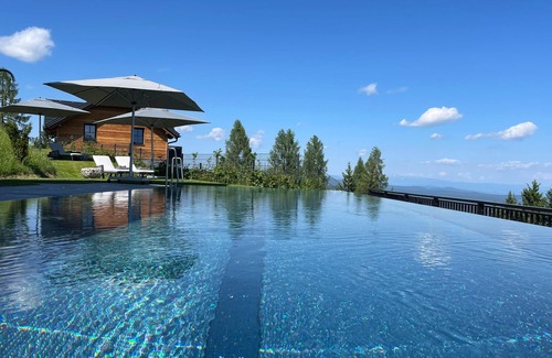 Albeck House | Tomtegl-Bergchalet No.12 mit Privatsauna, Infinitypool, Kamin, Fitnessraum, 1500m Seehöhe