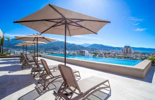 Diaz Ordaz House | Top-Floor 2BR with Skyline Views, Pool and Gym