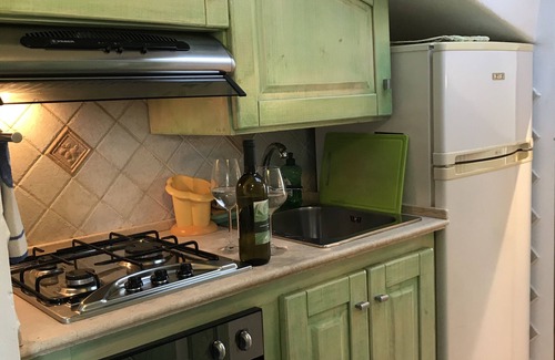 Oristano Apartment | Top floor small loft overlooking the old town near to the beach