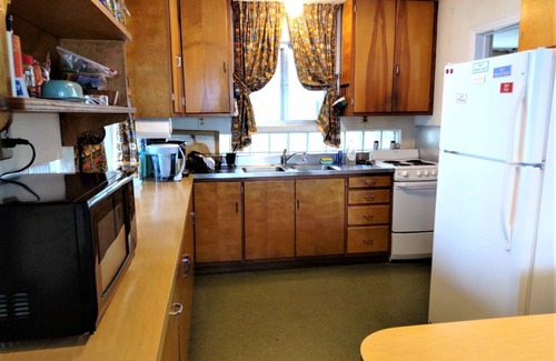 Rapid City House | Torch Lake with Sandy beach frontage