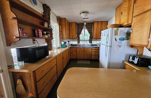 Rapid City House | Torch Lake with Sandy beach frontage