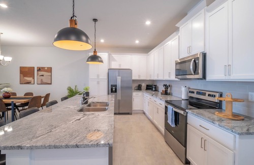 Florida Central Atlantic Coast House | Townhome in Kissimmee for remote workers or snowbirds with heated pool
