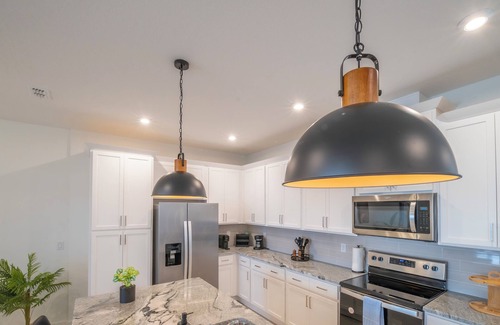Florida Central Atlantic Coast House | Townhome in Kissimmee for remote workers or snowbirds with heated pool