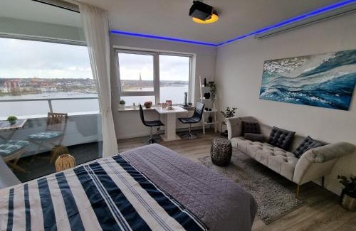 Schleswig Apartment | Traumblick! Mitten im Wasser, dem Himmel ganz nah!
