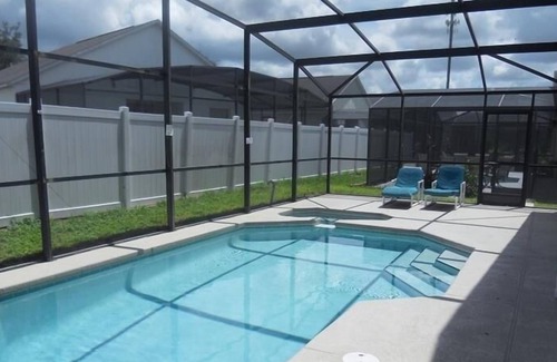 Sunset Ridge House | Treat Yourself with Private Pool at Sunset Ridge Davenport 5BR 3BA by RedAwning
