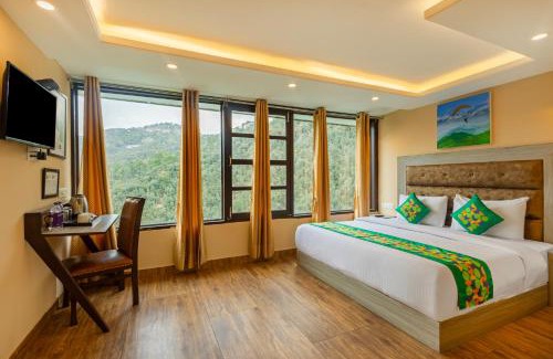 Shoghi Hotel | Treebo Lords Garden Glory
