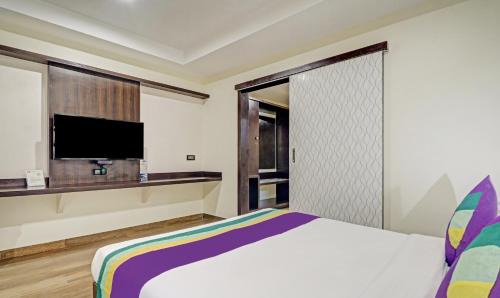 Bengaluru Hotel | Treebo Premium Raj Vista Global Village
