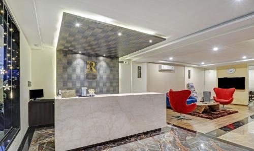 Bengaluru Hotel | Treebo Premium Raj Vista Global Village