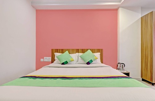 Nagavara Hotel | Treebo Sai Suites Inn Nagavara