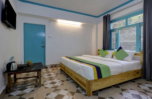 Almora Hotel | Treebo Trend Kasar Inn With Mountain View