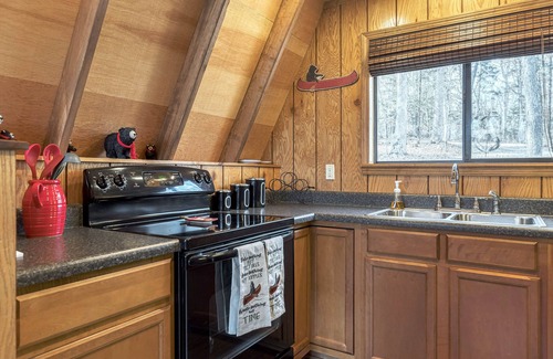 Wright City Ski Chalet | Treehouse Lodge by Sarah Bernard, a Woodland Retreat with Solo Stove Firepit