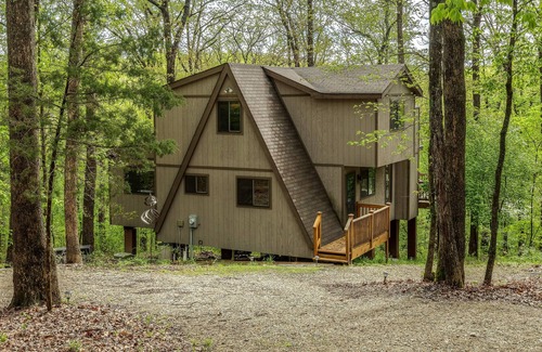 Wright City Ski Chalet | Treehouse Lodge by Sarah Bernard, a Woodland Retreat with Solo Stove Firepit