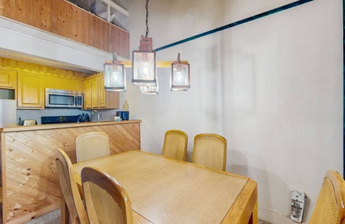 White Haven House | Treetop condo near golf + skiing with deck, grill, fireplace, & washer/dryer