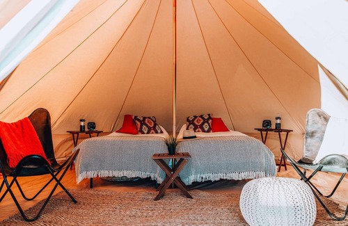 Island Park House | Triple Tent w/Shared Bathroom - Step into our open field between the mountains.