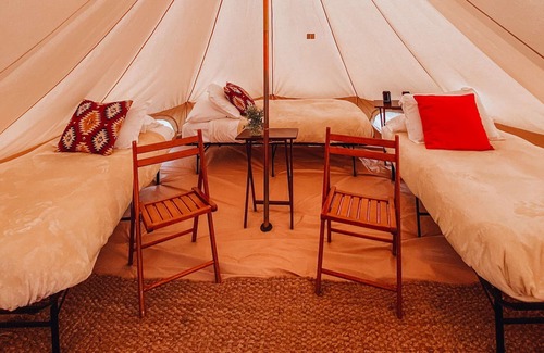 Island Park House | Triple Tent w/Shared Bathroom - Step into our open field between the mountains.