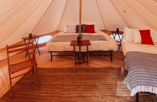 Island Park House | Triple Tent w/Shared Bathroom - Step into our open field between the mountains.
