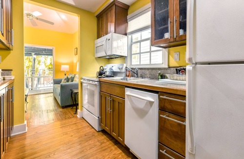 The Meadows Condo | Tropical Escape with Central Locale, Private Hot Tub, WiFi, and Shared Pool