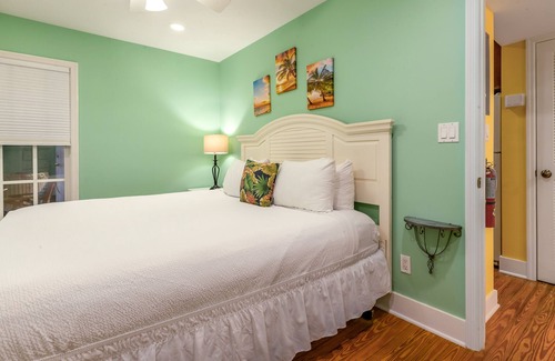The Meadows Condo | Tropical Escape with Central Locale, Private Hot Tub, WiFi, and Shared Pool