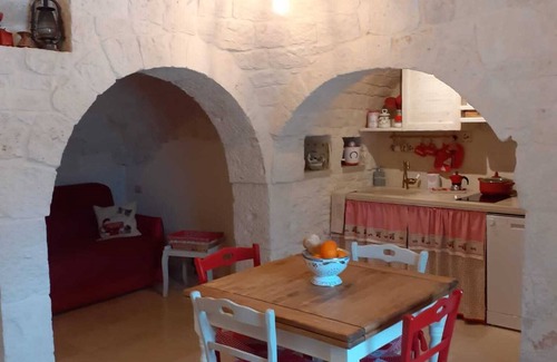Alberobello House | Trullo surrounded by nature with a beautiful view a stone's throw from the center