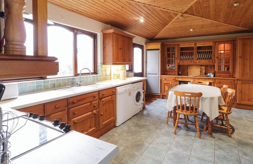 Newcastle Cottage | TUDOR LODGE, pet friendly, with a garden in Newcastle, County Down