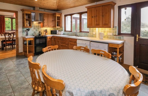 Newcastle Cottage | TUDOR LODGE, pet friendly, with a garden in Newcastle, County Down