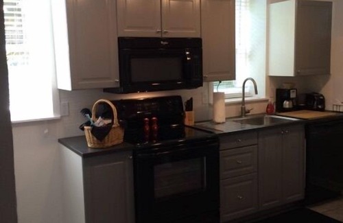 Governor's Walk House | Turn-Key Furnished Mid-Town Pool Side Bungalow